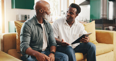 Father, son and talking with tablet at house for social media setup, discussion and bonding...