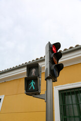 Traffic light on a street in Madrid, in its different colors and figures, whether red, green, amber...