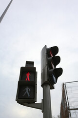 Traffic light on a street in Madrid, in its different colors and figures, whether red, green, amber...