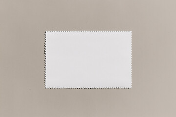 Blank Stamp Canvas: A rectangular, perforated stamp is centered, offering a clean slate for designs or messages, with a slightly textured surface and crisp edges.