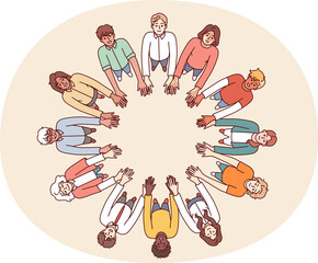 Friendly people stand in circle hold hands for collaboration and teamwork, top view. University students of different gender and race get education together while studying in college