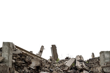 Gray concrete fragments of the remains of a building with green sparse shoots that survived the blockage, isolated on a white background