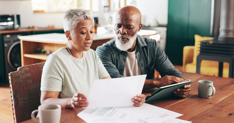 Mature, interracial couple and documents with tablet for financial discussion, planning or expenses...