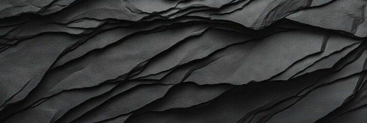 Obraz premium Matte black wall with subtle texture for interior design and background concepts