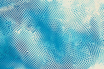 Fototapeta premium Abstract blue dotted texture creating a calming background for various design applications