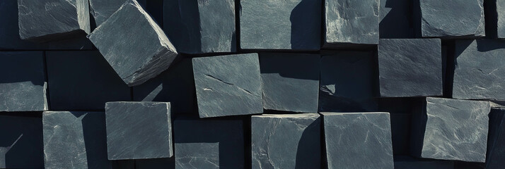 Textured black wall with deep dark tones for abstract background design