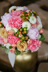 Elegant floral bouquet with pink, white, and peach flowers