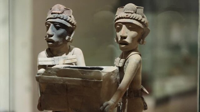 Olmec stone sculpture, depicting intricate symbols and sacred images of the Mesoamerican civilization.