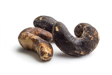Three roasted cashew nuts displayed on white background