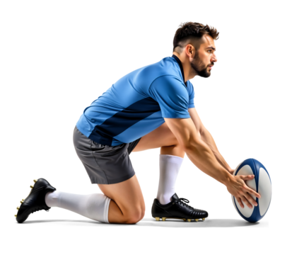 Male rugby player putting a rugby ball on the ground for a kick
