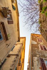 Fish-eye view of the old city on sky background