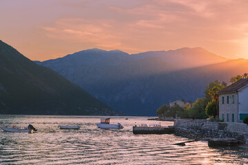 sea sunset on mountains background