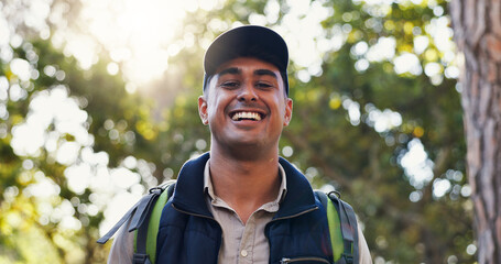 Portrait, smile and man hiking in forest of backpacking, travel adventure and fitness in...