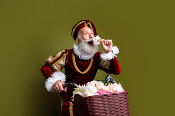 Elderly Nobleman in Historic Costume Enjoying a Moment of Whimsy with Flowers and Vintage Basket on...