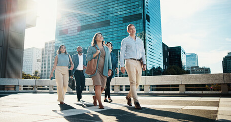 Corporate, walking and business people in city in discussion on morning commute, travel and...