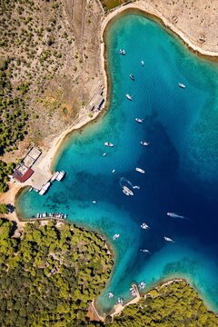 Island Sveti Grgur, Croatia, Adriatic Sea. Aerial view of beautiful  lagoon with yachts and crystal turquoise sea