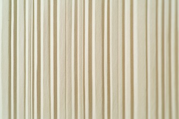 Beige vertical striped texture background.