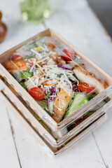 Healthy salads in plastic package for take away or food delivery.