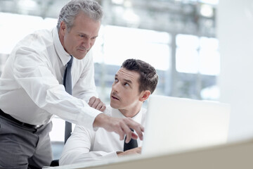Teamwork, business people and mentor with laptop in office, investment mistake and tax accountants....
