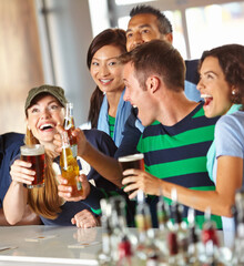 Beer, sports and friends in pub with toast, game and celebration for support together. Excited, winning cheers and group of people with alcohol, drink and broadcast television for team match in bar