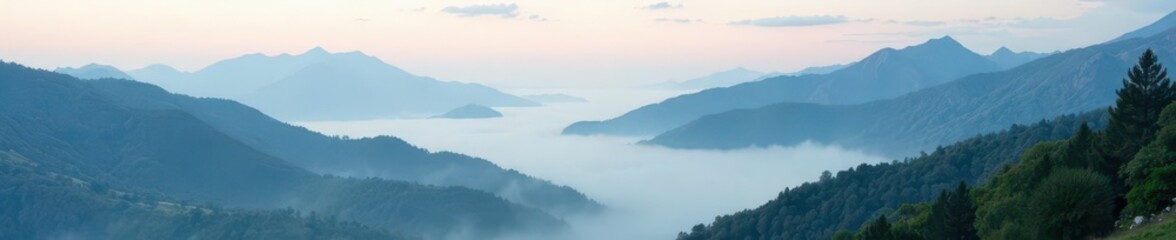 Fototapeta premium Mountainous terrain with misty fog rolling in, landscape, picture, terrain
