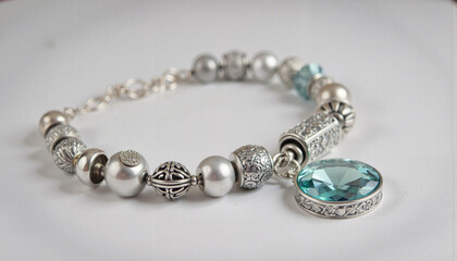 Elegant silver charm bracelet with aquamarine, timeless beauty