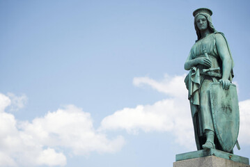 Bronze statue at the foot of the Concordia Column in Stuttgart - allegory of the military