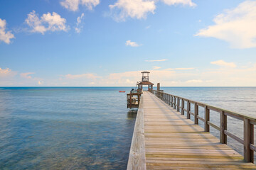 Fototapeta premium Wooden Dock in the Bay at Roatan, Honduras