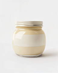 Creamy white jar filled with a smooth substance sits against a simple background in a natural light setting