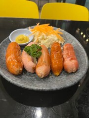 Food is any substance consumed to provide nutritional support for the body. It typically comes from plants, animals, or fungi and contains essential nutrients such as carbohydrates, proteins, fats, vi