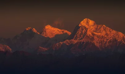 This is the Mount Everest family. The highest mountain over sea level is the one in centre. On its right side is Makalu and on the left is Lhotse. All these mountain peaks are over 8000 meters.