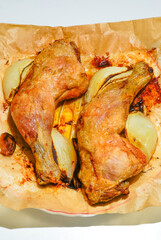 Roast chicken thighs with onion and garlic in air fryer.