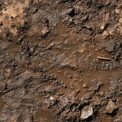 Seamless texture of wet muddy ground, soft brown tones with tiny puddles and organic debris