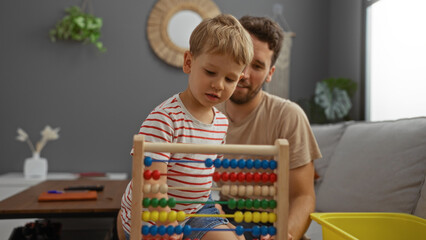 Father and son spending quality time together at home in the living room, playing with an abacus toy, symbolizing family love and childhood development in a cozy indoor setting.
