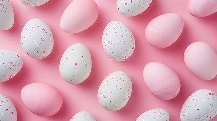 Obraz premium A row of eggs with pink and white spots
