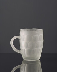Elegant gray glass mug showcasing a refreshing alcoholic beverage for modern dining experiences