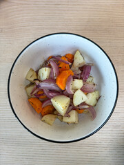 A bowl of roasted vegetables.