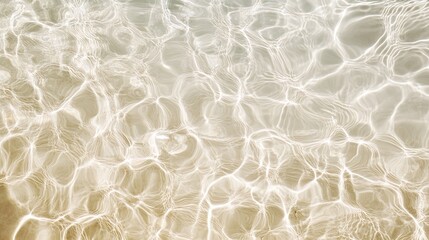 Obraz premium Shallow Water Ripples and Refracted Light on Sandy Bottom