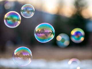 soap bubbles on a blue background. bubble, soap, water, sphere, bubbles, ball, glass, light, air, color, sky, illustration, circle, transparent, reflection, rainbow, blue, round, design, aqua, vector,