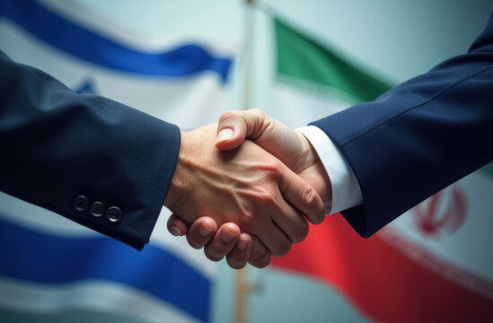 handshake of two politicians or businessmen against the background of the flags of Israel and Iran