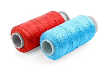 Spools of bright sewing threads isolated on white