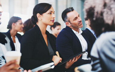 Tablet, woman and listening at company conference, digital notes and learning at corporate seminar. Person, attention and employee engagement with information, training and feedback for development