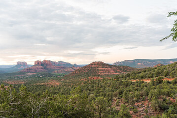 Sustainable travel scene in Sedona, Arizona’s red rock landscape at sunset