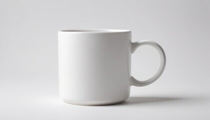 Obraz premium A Plain White Mug on a White Background