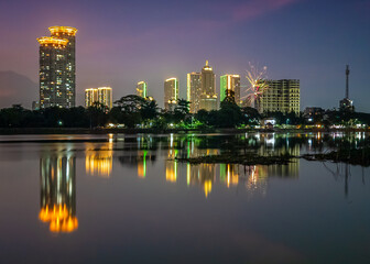 Lake city skyline at night
