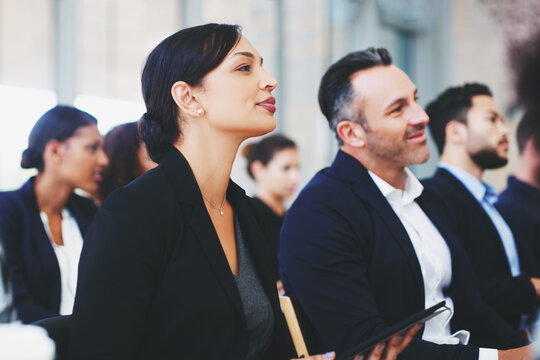 Business, group and listening at company conference, diversity and learning at corporate seminar. Crowd, attention and employee engagement with information, training and feedback for development