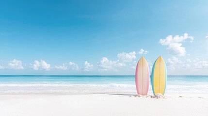 Two surfboards on tropical beach; ocean background; summer vacation