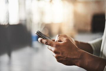 Hands, phone and texting on break at gym with contact, training or web chat at fitness class....