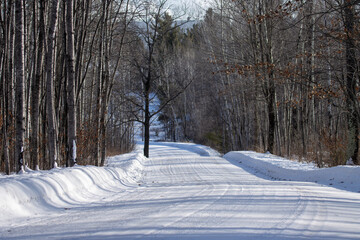 A snowy road in the winter