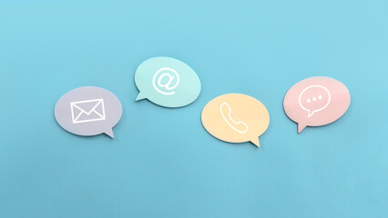 Icon of communication type on colourful speech bubble over a blue background. Contact us or Customer support hotline people connect.